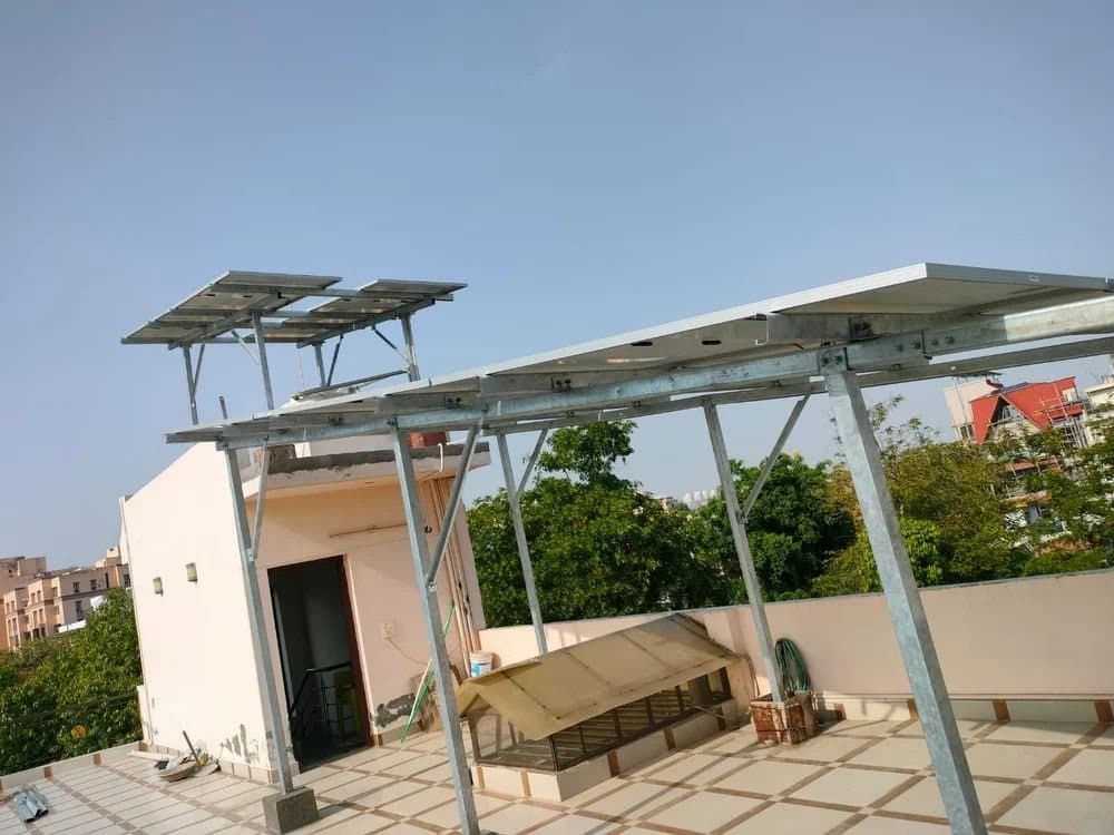 Panels on a pergola frame over a terrace